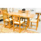 A set of six oak dining chairs by Wilf Hutchinson 'Squirrelman', five chairs and one carver, with