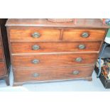 A Georgian mahogany chest of drawers, with two over three long graduated drawers, raised on short