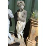 A Classical style garden statue, female figure.