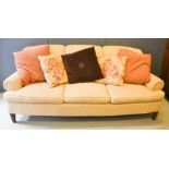 Ralph Lauren three seater settee, upholstered in cream, with original cushions, including brown