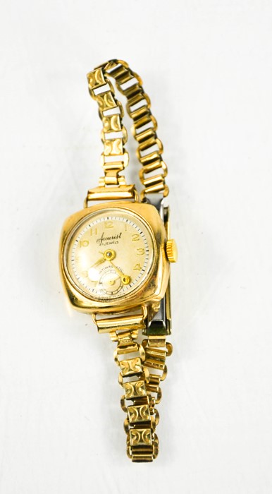 A 9ct gold Accurist wristwatch with gold plated strap.