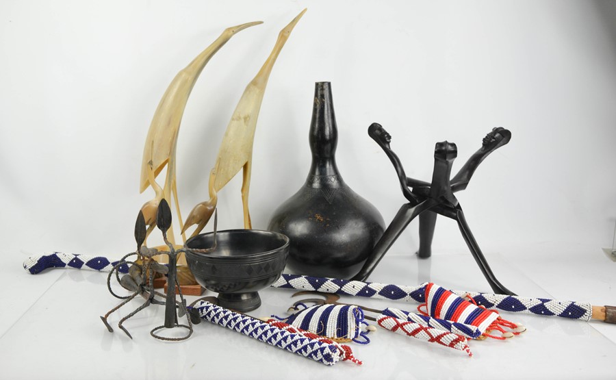 A quantity of African collectables, to include jar on stand, beaded tribal ware, and other items.