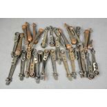 A group of antique bronzed metal stair carpet clips, 30 in total.