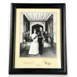 Autographs: signed photograph of Queen Elizabeth and Prince Philip, dated 1983, 33cm high. Please