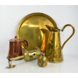A group of brass and copper to include a Barron of London measure, tray, jugs and other items.