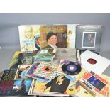 A large group of Frank Sinatra 7" singles and LP records to include come fly with me, at the