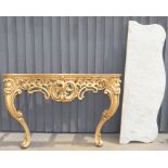 A French style giltwood and marble top console table with pierced central cartouche and scrolling