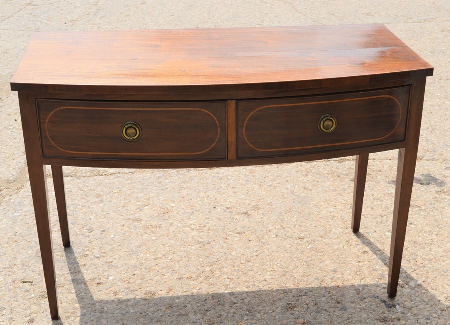 A Regency two drawer side table with inlaid decoration, 113cm by 56cm by 77cm high