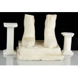 Eduardo Paolozzi (1924-2005): two plaster columns and a pair of feet A/F. Feet 12cms tall to include