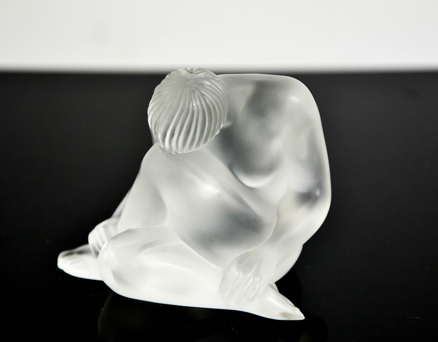 A Rene Lalique nude figure, etched Lalique to the base, 7cms tall