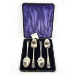 A set of four 18th century George Smith silver serving spoons, London 1782 and 1783, in the original
