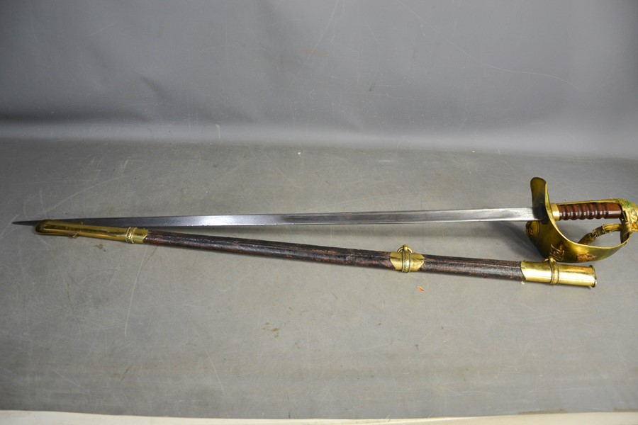 An RAF dress sword with brass hilt, complete with dust sheet, and leather scabbard, with applied RAF - Image 7 of 7