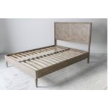 A French style modern bed by Frank Hudson in the 'Mustique' design, with panelled head board, in
