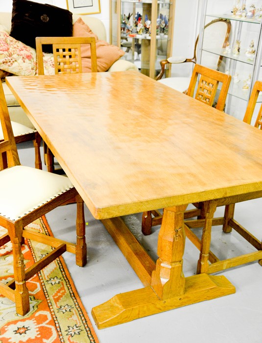 A Wilf Hutchinson 'Squirrelman' oak refectory/trestle table, with adzed top, the carved pillars