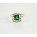 An 18ct white gold Art Deco style emerald and diamond ring, J½, 2.7g.