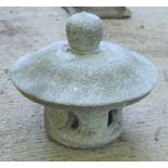 A granite Chinese style pagoda form garden incense burner. 37cms