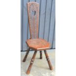 A 19th century Welsh oak carved spinning chair dated 1898, 92cm high by 30cm wide by 43cm depth