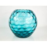 A mid-century turquoise glass vase, 23cms high.