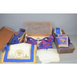 A group of masonic regalia and leather cases to include a sash and apron in its original Spencer &