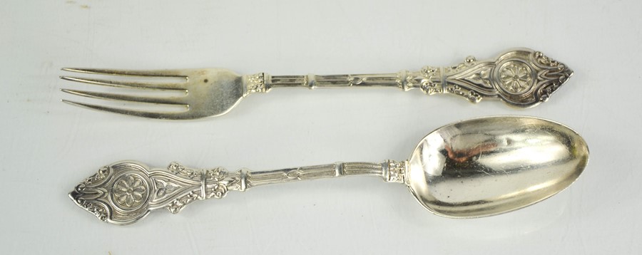 A silver knife and spoon, embossed with architectural style decoration, Sheffield 1862, Henry