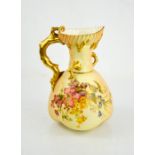 A Royal Worcester blush ivory jug painted with flowers, with a coral gilt handle, date code 1903,