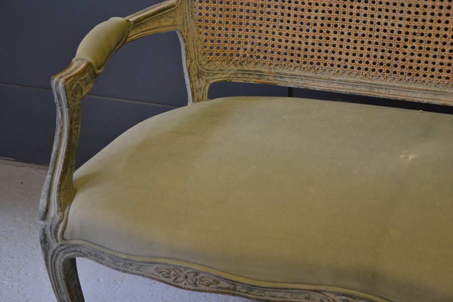 A French 19th century style settee, the caned back with floral carved back, shaped arms and - Image 3 of 3