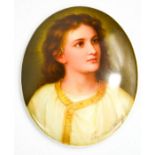 A porcelain oval plaque, painted by Hoffman, with a head and shoulder portrait of a lady wearing a