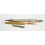 A 9ct gold propelling pencil, 14.5g, and a silver biro, both machine engraved, and having a case