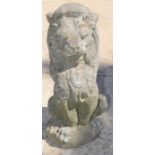 A reconstituted stone lion garden ornament 61cms