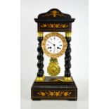 A 19th century French Portico clock circa 1888, the ebonised and inlaid case surrounding the