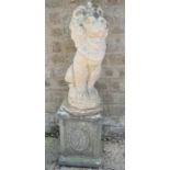 A reconstituted stone lion garden ornament and plinth 81cms