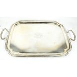 A large silver tray with engraved initials and inscribed '18th April 1921', twin handles and re-