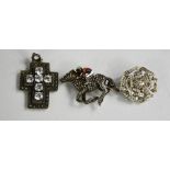Three brooches, to include a silver, marcasite and enamelled example in the form of a horse and