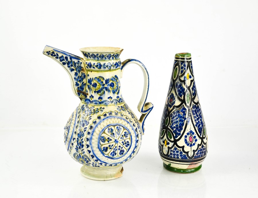 A 19th century Eastern pottery water jug together with vase.