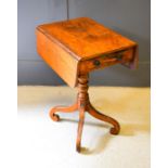 A 19th century Pembroke table, with single drawer, drop leaves and raised on four scroll feet. 67 by