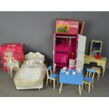 A group of vintage Sindy examples, to include wardrobe, bedside table and lamp (with original