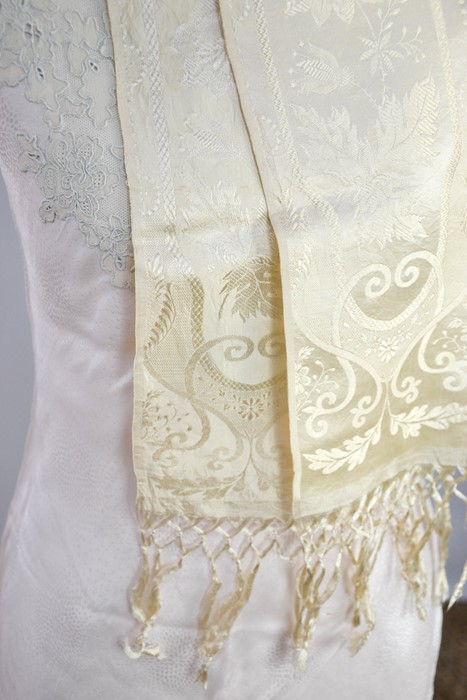 An early 20th century cream silk scarf, embroidered with decoration, and a fine silk full length - Image 3 of 5