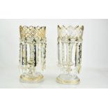 A pair of Victorian glass lustres, with cut glass bowls and stands, complete with cut glass drops,