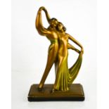 An Art Deco ceramic dancing couple.