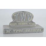 A commemorative desk paperweight to mark the centenary of T.W.W "Thos. W. Ward Ltd" 1878-1928,