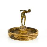 Dimitri Chiparus (1886-1947): a bronze Art Deco dancer with hoop, raised above a marble potpourri