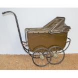 A vintage Marmet "The worlds lightest baby carriage" pram with hood.