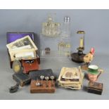 A group of vintage photographs and postcards together with a cruet set, bibles,, brass bellows,