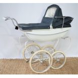 A vintage white and navy Silver-Cross coach built dolls pram