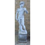 A Classical style garden statue on plinth, male figure. 164cms