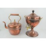 A Victorian copper kettle and a copper urn.