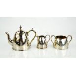An Elkington & Co silver plated tea set comprising teapot, jug and sugar bowl.