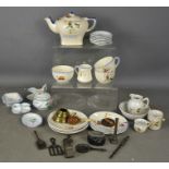 A quantity of vintage children's tea sets.