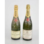A Moet & Chandon Brut Imperial 75cl and a Moet & Chandon dry Imperial 75cl 1966.