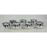 A set of blue and white Crown Derby pattern cups and saucers.